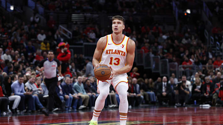 Nov 22, 2024; Chicago, Illinois, USA; Atlanta Hawks guard Bogdan Bogdanovic (13) looks to shoot against the Chicago Bulls during the second half at United Center. Mandatory Credit: Kamil Krzaczynski-Imagn Images