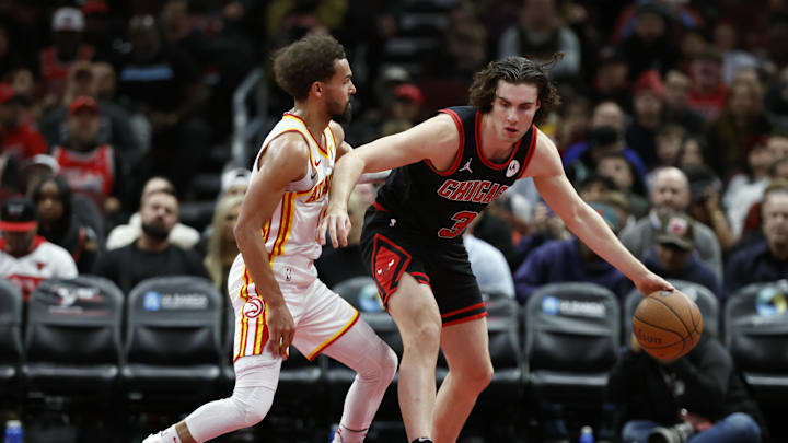 Nov 22, 2024; Chicago, Illinois, USA; Atlanta Hawks guard Trae Young (11) defends against Chicago Bulls guard Josh Giddey (3) during the second half at United Center. Mandatory Credit: Kamil Krzaczynski-Imagn Images Nov 22, 2024; Chicago, Illinois, USA; Atlanta Hawks guard Trae Young (11) defends against Chicago Bulls guard Josh Giddey (3) during the second half at United Center. Mandatory Credit: Kamil Krzaczynski-Imagn Images