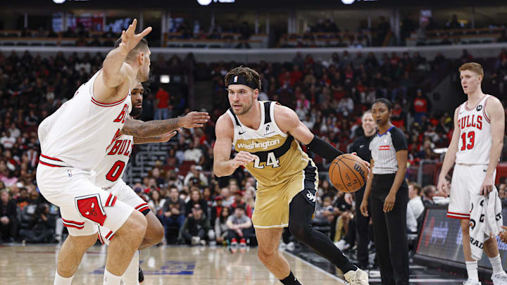 Nov 22, 2025; Chicago, Illinois, USA; Washington Wizards forward Corey Kispert (24) drives to the basket against the Chicago Bulls during the second half at United Center. Mandatory Credit: Kamil Krzaczynski-Imagn Images
