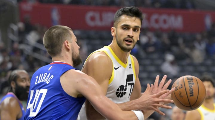 Apr 5, 2024; Los Angeles, California, USA; Utah Jazz center Omer Yurtseven (77) is fouled by Los Angeles Clippers center Ivica Zubac (40) in the first half at Crypto.com Arena. Mandatory Credit: Jayne Kamin-Oncea-USA TODAY Sports