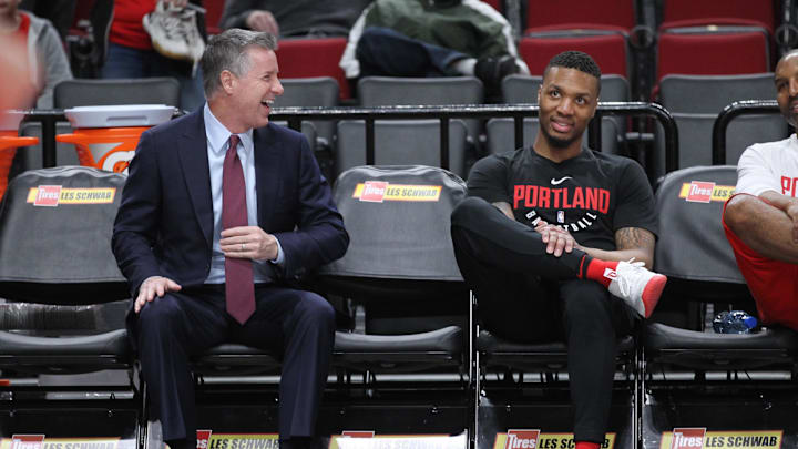 Mar 15, 2018; Portland, OR, USA; Portland Trail Blazers general manager Neil Olshey shares a laugh Mar 15, 2018; Portland, OR, USA; Portland Trail Blazers general manager Neil Olshey shares a laugh