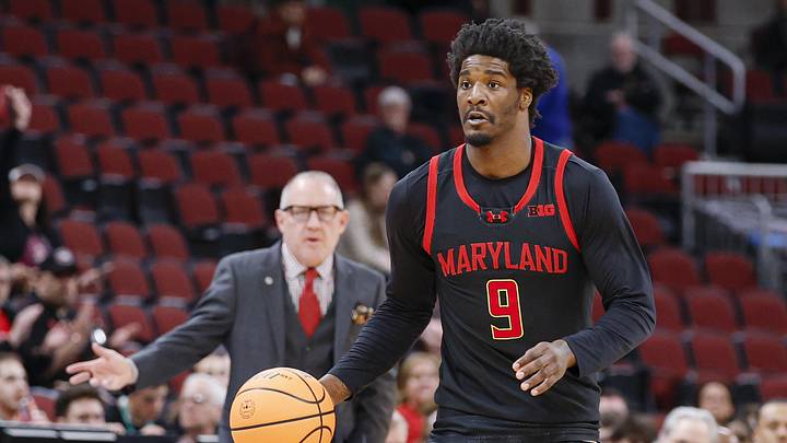 Mar 10, 2026; Chicago, IL, USA; Maryland Terrapins forward Solomon Washington (9) brings the ball up court against the Oregon Ducks during the first half at United Center. Mandatory Credit: Kamil Krzaczynski-Imagn Images