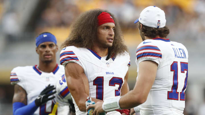 Aug 17, 2024; Pittsburgh, Pennsylvania, USA;  Buffalo Bills wide receiver Mack Hollins (13) and quarterback Josh Allen (17) talk on the field against the Pittsburgh Steelers during the second quarter at Acrisure Stadium. Mandatory Credit: Charles LeClaire-Imagn Images
