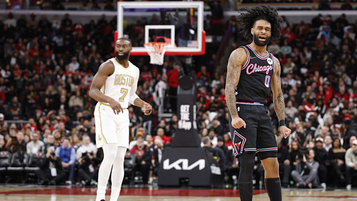 Jan 24, 2026; Chicago, Illinois, USA; Chicago Bulls guard Coby White (0) reacts after scoring against the Boston Celtics during the first half at United Center. Mandatory Credit: Kamil Krzaczynski-Imagn Images