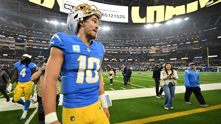 Dec 19, 2024; Inglewood, California, USA;  Los Angeles Chargers quarterback Justin Herbert (10) celebrates as he leaves the field after defeating the Denver Broncos at SoFi Stadium. Mandatory Credit: Jayne Kamin-Oncea-Imagn Images