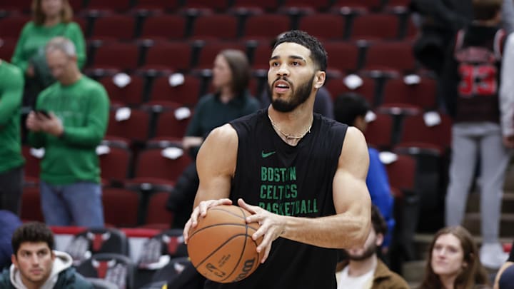 Dec 21, 2024; Chicago, Illinois, USA; Boston Celtics forward Jayson Tatum (0) warms up before a basketball game against the Chicago Bulls at United Center. Mandatory Credit: Kamil Krzaczynski-Imagn Images