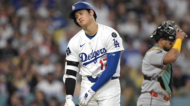 May 21, 2025; Los Angeles, California, USA; Los Angeles Dodgers designated hitter Shohei Ohtani (17) reacts after fouling a ball off his leg in the sixth inning against the Arizona Diamondbacks at Dodger Stadium. Mandatory Credit: Jayne Kamin-Oncea-Imagn Images May 21, 2025; Los Angeles, California, USA; Los Angeles Dodgers designated hitter Shohei Ohtani (17) reacts after fouling a ball off his leg in the sixth inning against the Arizona Diamondbacks at Dodger Stadium. Mandatory Credit: Jayne Kamin-Oncea-Imagn Images