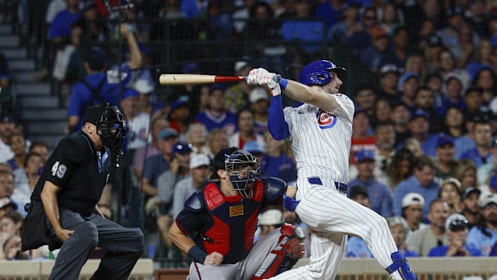 Sep 5, 2025; Chicago, Illinois, USA; Chicago Cubs right fielder Kyle Tucker (30) hits a three-run home run against the Atlanta Braves during the third inning at Wrigley Field. Mandatory Credit: Kamil Krzaczynski-Imagn Images