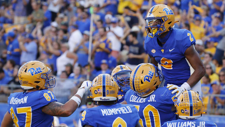 Sep 21, 2024; Pittsburgh, Pennsylvania, USA; Pittsburgh Panthers wide receiver Kenny Johnson (2) celebrates with teammates after scoring a touchdown against the Youngstown State Penguins during the second quarter at Acrisure Stadium. Mandatory Credit: Charles LeClaire-Imagn Images