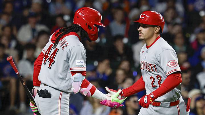 May 4, 2026; Chicago, Illinois, USA; Cincinnati Reds left fielder JJ Bleday (22) celebrates with shortstop Elly de la Cruz (44) after hitting a solo home run against the Chicago Cubs during the third inning at Wrigley Field. Mandatory Credit: Kamil Krzaczynski-Imagn Images