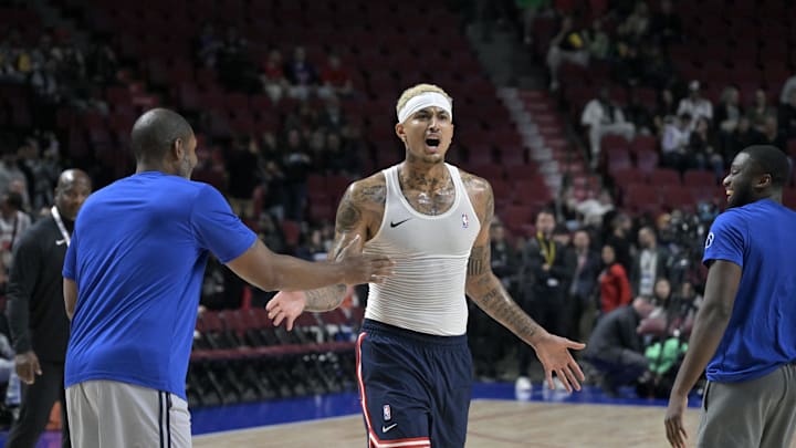 Oct 6, 2024; Montreal, Quebec, CAN; Washington Wizards small forward Kyle Kuzma (33) reacts after making a trick shot before the game against the Toronto Raptors at the Bell Centre. Mandatory Credit: Eric Bolte-Imagn Images Oct 6, 2024; Montreal, Quebec, CAN; Washington Wizards small forward Kyle Kuzma (33) reacts after making a trick shot before the game against the Toronto Raptors at the Bell Centre. Mandatory Credit: Eric Bolte-Imagn Images