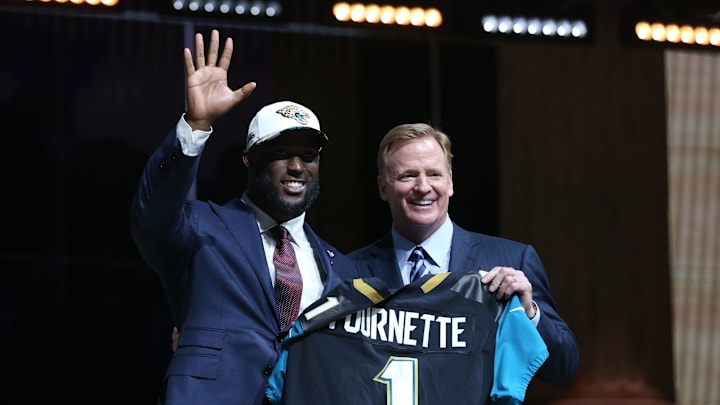 Apr 27, 2017; Philadelphia, PA, USA; Leonard Fournette (LSU) poses with NFL commissioner Roger Goodell as he is selected as the number 4 overall pick to the Jacksonville Jaguars in the first round the 2017 NFL Draft at Philadelphia Museum of Art. Mandatory Credit: Bill Streicher-Imagn Images