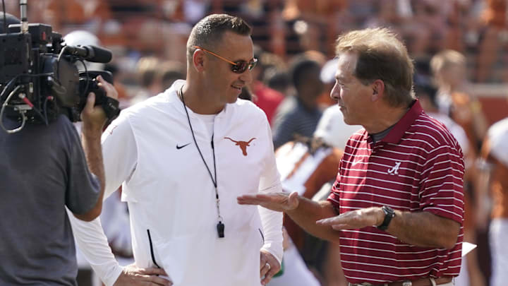 Sep 10, 2022; Austin, Texas, USA; Texas Longhorns head coach Steve Sarkisian talks with Alabama Crimson Tide head coach Nick Saban before the game at Darrell K Royal-Texas Memorial Stadium. Mandatory Credit: Scott Wachter-Imagn Images