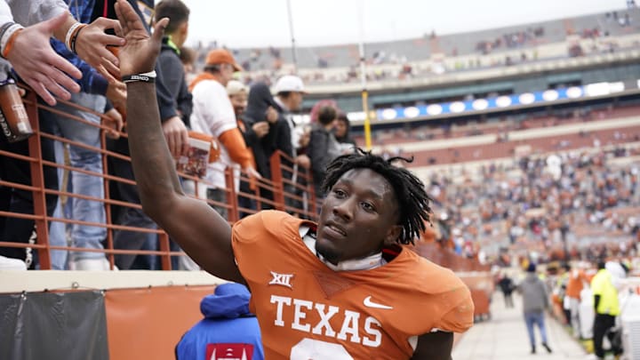 Nov 25, 2022; Austin, Texas, USA; Texas Longhorns linebacker DeMarvion Overshown (0) greets fans after a victory over the Baylor Bears at Darrell K Royal-Texas Memorial Stadium. Mandatory Credit: Scott Wachter-Imagn Images