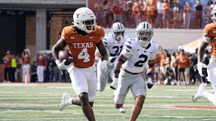 Texas Longhorns running back CJ Baxter runs for a touchdown against the Kansas State Wildcats. Texas Longhorns running back CJ Baxter runs for a touchdown against the Kansas State Wildcats.