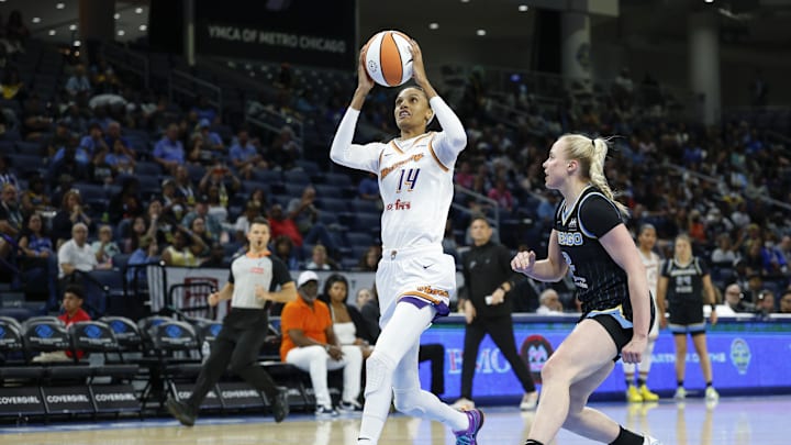 Aug 3, 2025; Chicago, Illinois, USA; Phoenix Mercury forward DeWanna Bonner (14) goes to the basket against Chicago Sky guard Hailey Van Lith (2) during the first half at Wintrust Arena. Mandatory Credit: Kamil Krzaczynski-Imagn Images