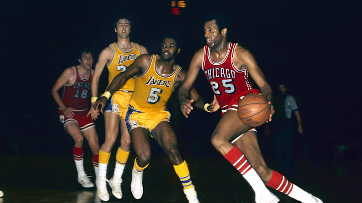 Unknown date; Los Angeles, CA, USA; FILE PHOTO; Chicago Bulls forward Chet Walker (25) drives to the basket as he is defended by Los Angeles Lakers forward Jim McMillan (5) at the Forum. Unknown date; Los Angeles, CA, USA; FILE PHOTO; Chicago Bulls forward Chet Walker (25) drives to the basket as he is defended by Los Angeles Lakers forward Jim McMillan (5) at the Forum.