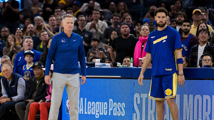 Oct 21, 2022; San Francisco, California, USA; Golden State Warriors head coach Steve Kerr and guard Klay Thompson (11) Oct 21, 2022; San Francisco, California, USA; Golden State Warriors head coach Steve Kerr and guard Klay Thompson (11)