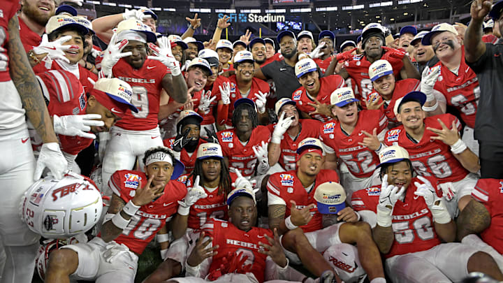 The UNLV Rebels celebrate after defeating the California Golden Bears in the LA Bowl at SoFi Stadium.