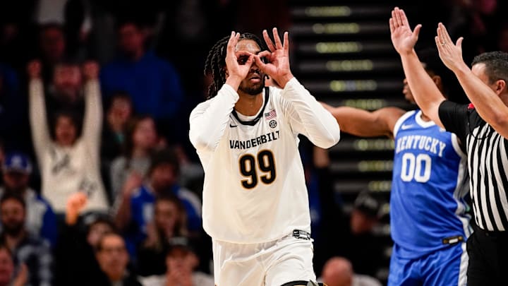 Vanderbilt forward Devin McGlockton (99) celebrates a three-point basket against Kentucky during the first half at Memorial Gymnasium in Nashville, Tenn., Tuesday, Jan. 27, 2026.