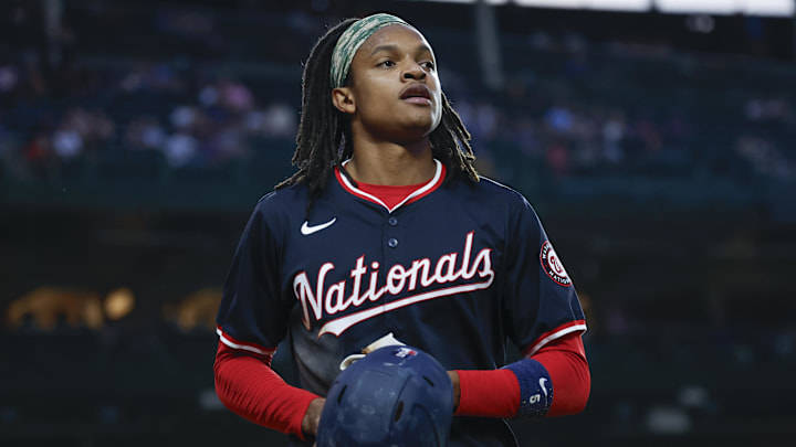 Sep 19, 2024; Chicago, Illinois, USA; Washington Nationals shortstop CJ Abrams (5) smiles after scoring against the Chicago Cubs during the first inning at Wrigley Field. Mandatory Credit: Kamil Krzaczynski-Imagn Images