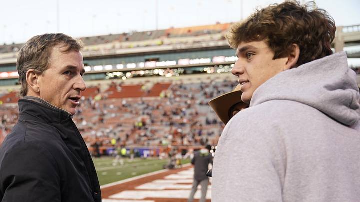 Nov 12, 2022; Austin, Texas, USA; Texas Longhorns quarterback recruit Arch Manning with his father Cooper Manning