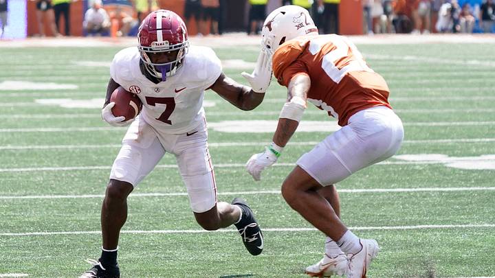 Alabama Crimson Tide wide receiver Ja'Corey Brooks (7) defended by Texas Longhorns defensive back Jerrin Thompson (28) after catching a pass during the second half at Darrell K Royal-Texas Memorial Stadium. 