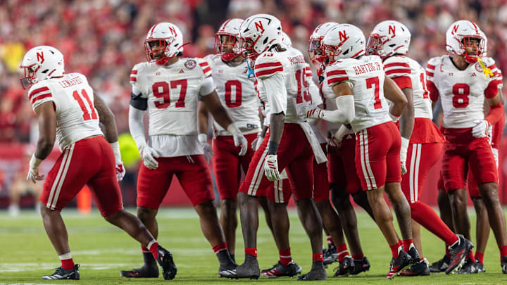 Members of the Nebraska defense prepare to take the field against Cincinnati.