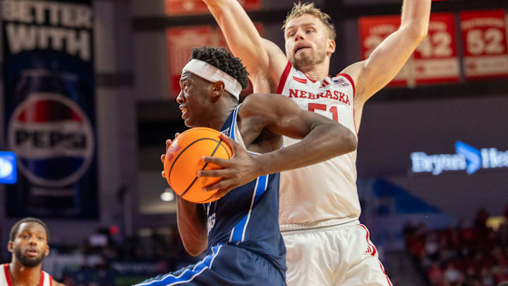 BYU forward AJ Dybansta drives against Nebraska's Rienk Mast.