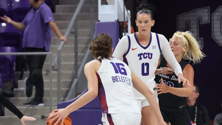 Clara Bielefield drives inside as Kennedy Basham sets the screen Clara Bielefield drives inside as Kennedy Basham sets the screen