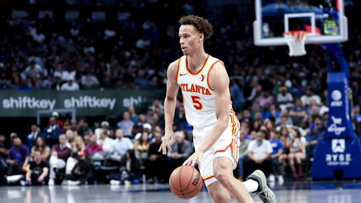 Apr 2, 2025; Dallas, Texas, USA;  Atlanta Hawks guard Dyson Daniels (5) dribbles against the Dallas Mavericks during the second half at American Airlines Center. Mandatory Credit: Kevin Jairaj-Imagn Images