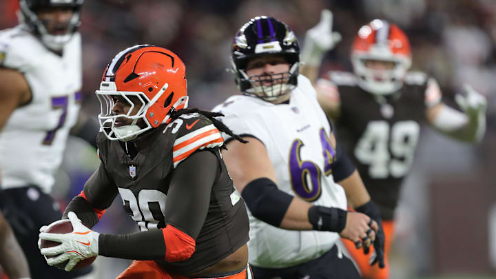 Cleveland Browns linebacker Devin Bush (30) returns an interception for a touchdown against the Baltimore Ravens during the first half of NFL football game at Huntington Bank Field, Nov. 16, 2025, in Cleveland, Ohio.