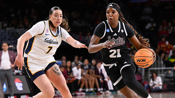 Mar 22, 2025; Los Angeles, California, USA; Mississippi State Bulldogs guard Debreasha Powe (21) drives to the basket past California Golden Bears forward Marta Suarez (7) during the first quarter of an NCAA Tournament game at Galen Center. Mandatory Credit: Robert Hanashiro-Imagn Images Mar 22, 2025; Los Angeles, California, USA; Mississippi State Bulldogs guard Debreasha Powe (21) drives to the basket past California Golden Bears forward Marta Suarez (7) during the first quarter of an NCAA Tournament game at Galen Center. Mandatory Credit: Robert Hanashiro-Imagn Images
