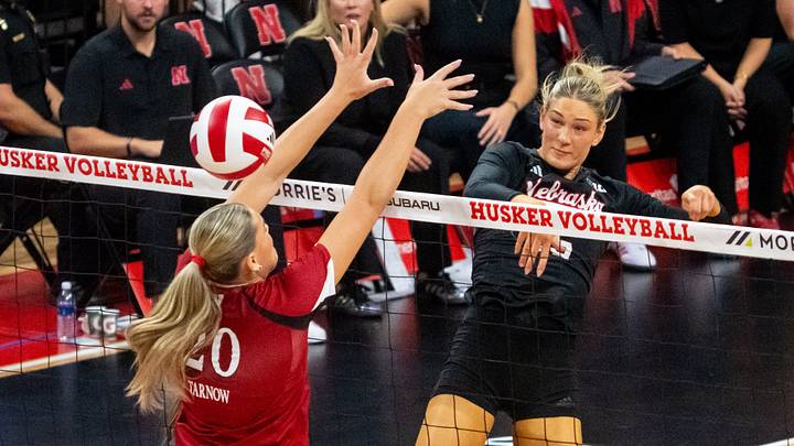Oct 10, 2026; Lincoln, Nebraska, USA; Nebraska Cornhuskers middle blocker Andi Jackson (15) gets a kill against Wisconsin Badgers middle blocker Lynney Tarnow (20) during the second set at Bob Devaney Sport Center. Mandatory Credit: Dylan Widger-Imagn Images Oct 10, 2026; Lincoln, Nebraska, USA; Nebraska Cornhuskers middle blocker Andi Jackson (15) gets a kill against Wisconsin Badgers middle blocker Lynney Tarnow (20) during the second set at Bob Devaney Sport Center. Mandatory Credit: Dylan Widger-Imagn Images