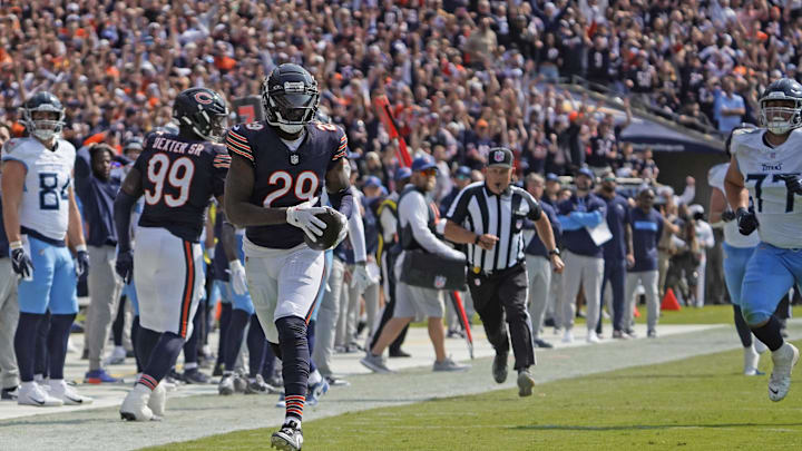 Sep 8, 2024; Chicago, Illinois, USA; Chicago Bears cornerback Tyrique Stevenson (29) intercepts a pass against the Tennessee Titans for a touchdown during the second half at Soldier Field. Mandatory Credit: David Banks-Imagn Images