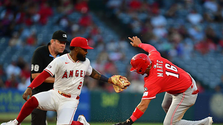 Aug 20, 2025; Anaheim, California, USA; Cincinnati Reds right fielder Noelvi Marte (16) is tagged out at second on a runners fielder choice by Los Angeles Angels second baseman Luis Rengifo (2) during the third inning at Angel Stadium. Mandatory Credit: Gary A. Vasquez-Imagn Images Aug 20, 2025; Anaheim, California, USA; Cincinnati Reds right fielder Noelvi Marte (16) is tagged out at second on a runners fielder choice by Los Angeles Angels second baseman Luis Rengifo (2) during the third inning at Angel Stadium. Mandatory Credit: Gary A. Vasquez-Imagn Images