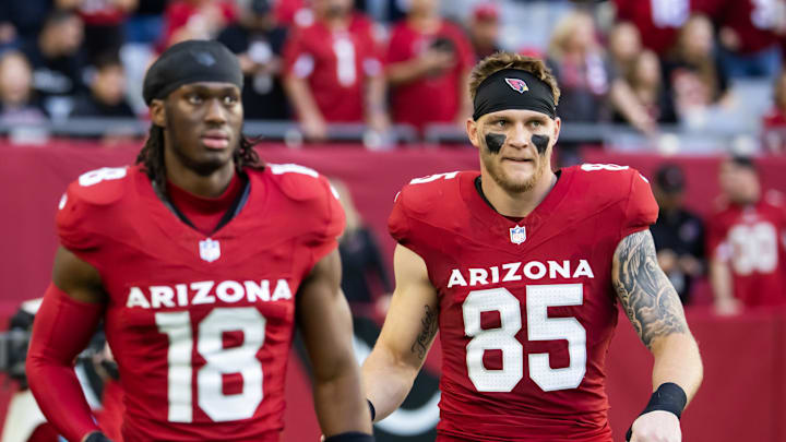 Jan 5, 2025; Glendale, Arizona, USA; Arizona Cardinals wide receiver Marvin Harrison Jr. (18) and tight end Trey McBride (85) against the San Francisco 49ers at State Farm Stadium. Mandatory Credit: Mark J. Rebilas-Imagn Images