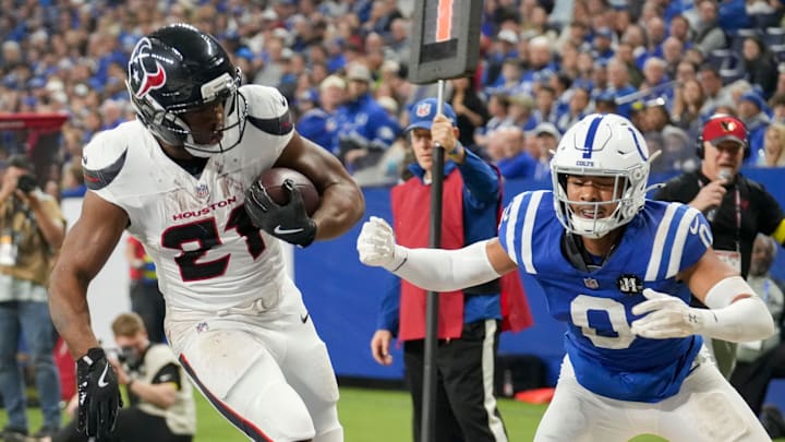Houston Texans running back Nick Chubb (21) rushes past Indianapolis Colts safety Camryn Bynum (0) for a touchdown Sunday, Nov. 30, 2025, during a game at Lucas Oil Stadium in Indianapolis. Houston Texans running back Nick Chubb (21) rushes past Indianapolis Colts safety Camryn Bynum (0) for a touchdown Sunday, Nov. 30, 2025, during a game at Lucas Oil Stadium in Indianapolis.