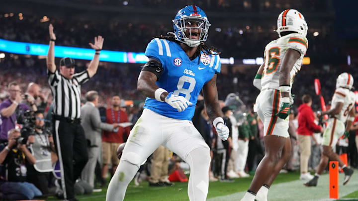 Ole Miss Rebels tight end Dae'Quan Wright (8) celebrates his touchdown catch against the Miami Hurricanes during their Vrbo Fiesta Bowl matchup at State Farm Stadium on Jan. 8, 2026.