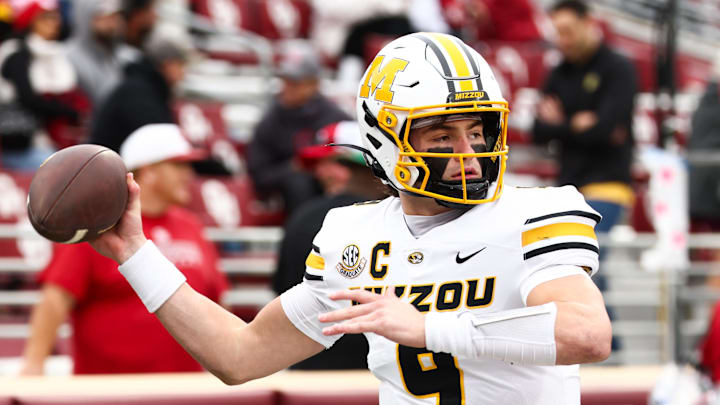 Nov 22, 2025; Norman, Oklahoma, USA;  Missouri Tigers quarterback Beau Pribula (9) warms up before the game against the Oklahoma Sooners at Gaylord Family-Oklahoma Memorial Stadium. Mandatory Credit: Kevin Jairaj-Imagn Images