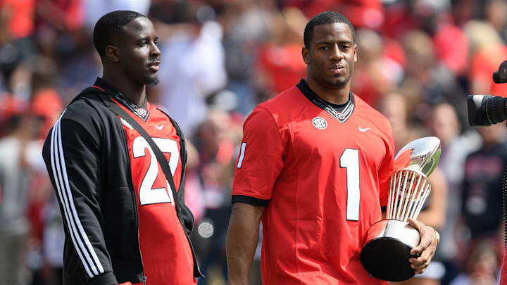 Apr 21, 2018; Athens, GA, USA; Georgia Bulldogs former players Sony Michel (left) and Nick Chubb carry the Rose Bowl Trophy on the field prior to the Georgia Spring Game at Sanford Stadium. Mandatory Credit: Dale Zanine-Imagn Images Apr 21, 2018; Athens, GA, USA; Georgia Bulldogs former players Sony Michel (left) and Nick Chubb carry the Rose Bowl Trophy on the field prior to the Georgia Spring Game at Sanford Stadium. Mandatory Credit: Dale Zanine-Imagn Images