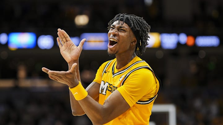 Dec 8, 2024; Columbia, Missouri, USA; Missouri Tigers guard Anthony Robinson II (0) celebrates during the second half against the Kansas Jayhawks at Mizzou Arena. Mandatory Credit: Jay Biggerstaff-Imagn Images Dec 8, 2024; Columbia, Missouri, USA; Missouri Tigers guard Anthony Robinson II (0) celebrates during the second half against the Kansas Jayhawks at Mizzou Arena. Mandatory Credit: Jay Biggerstaff-Imagn Images