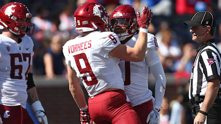 Oct 11, 2025; Oxford, Mississippi, USA; Washington State Cougars running back Kirby Vorhees (9) and wide reciever Tony Freeman (0) react after a touchdown during the third quarter against the Mississippi Rebels at Vaught-Hemingway Stadium. Mandatory Credit: Petre Thomas-Imagn Images