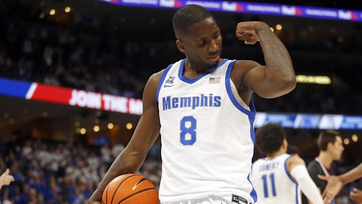 Feb 25, 2024; Memphis, Tennessee, USA; Memphis Tigers forward David Jones (8) reacts after a rebound