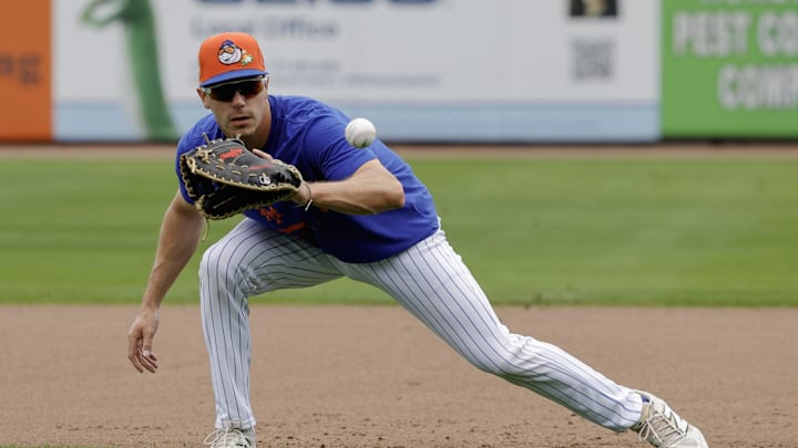 Feb 17, 2026; Port St. Lucie, FL, USA; New York Mets left fielder Jared Young (29) fields a ball during the New York Mets spring training workouts at Clover Park. Mandatory Credit: Reinhold Matay-Imagn Images Feb 17, 2026; Port St. Lucie, FL, USA; New York Mets left fielder Jared Young (29) fields a ball during the New York Mets spring training workouts at Clover Park. Mandatory Credit: Reinhold Matay-Imagn Images