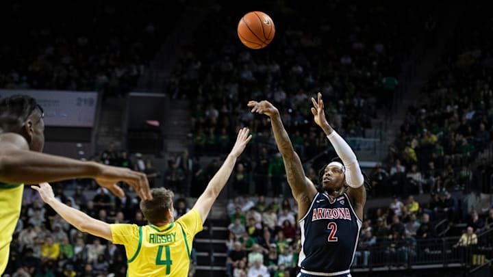 Arizona guard Caleb Love puts up a shot for three as the Oregon Ducks host the Arizona Wildcats Saturday, Jan. 27, 2024 at Matthew Knight Arena in Eugene, Ore.