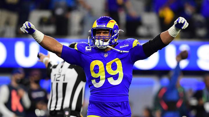 Jan 30, 2022; Inglewood, California, USA; Los Angeles Rams defensive end Aaron Donald (99) celebrates in the fourth quarter during the NFC Championship Game against the San Francisco 49ers at SoFi Stadium. Mandatory Credit: Gary A. Vasquez-Imagn Images