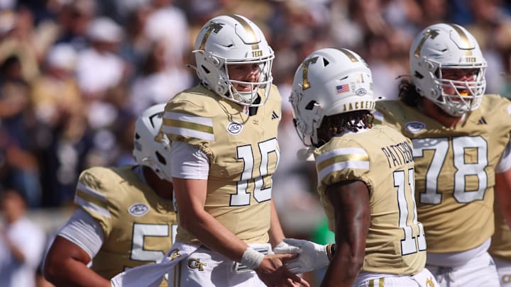 Oct 25, 2025; Atlanta, Georgia, USA; Georgia Tech Yellow Jackets quarterback Haynes King (10) celebrates after a touchdown against the Syracuse Orange in the third quarter at Bobby Dodd Stadium at Hyundai Field. Mandatory Credit: Brett Davis-Imagn Images
