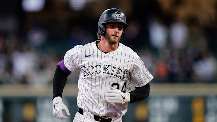 Apr 9, 2025; Denver, Colorado, USA; Colorado Rockies third baseman Ryan McMahon (24) rounds the bases on a solo home run in the third inning against the Milwaukee Brewers at Coors Field. Mandatory Credit: Isaiah J. Downing-Imagn Images