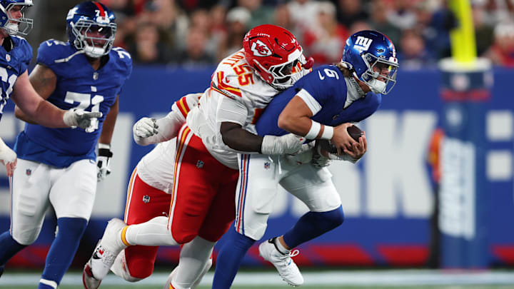 Sep 21, 2025; East Rutherford, New Jersey, USA; New York Giants quarterback Jaxson Dart (6) runs against Kansas City Chiefs defensive tackle Omarr Norman-Lott (55) in the third quarter at MetLife Stadium. Mandatory Credit: Vincent Carchietta-Imagn Images